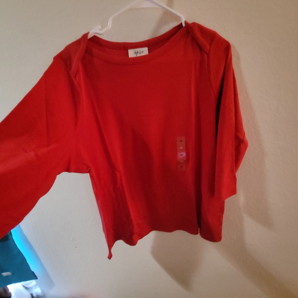 Casual red shirt never worn also comes in black both for $20 or 10ea